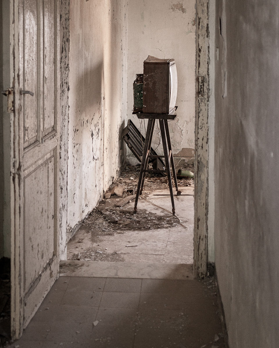Old television set in an abandoned room in Ferruzzano Superiore, Calabria.